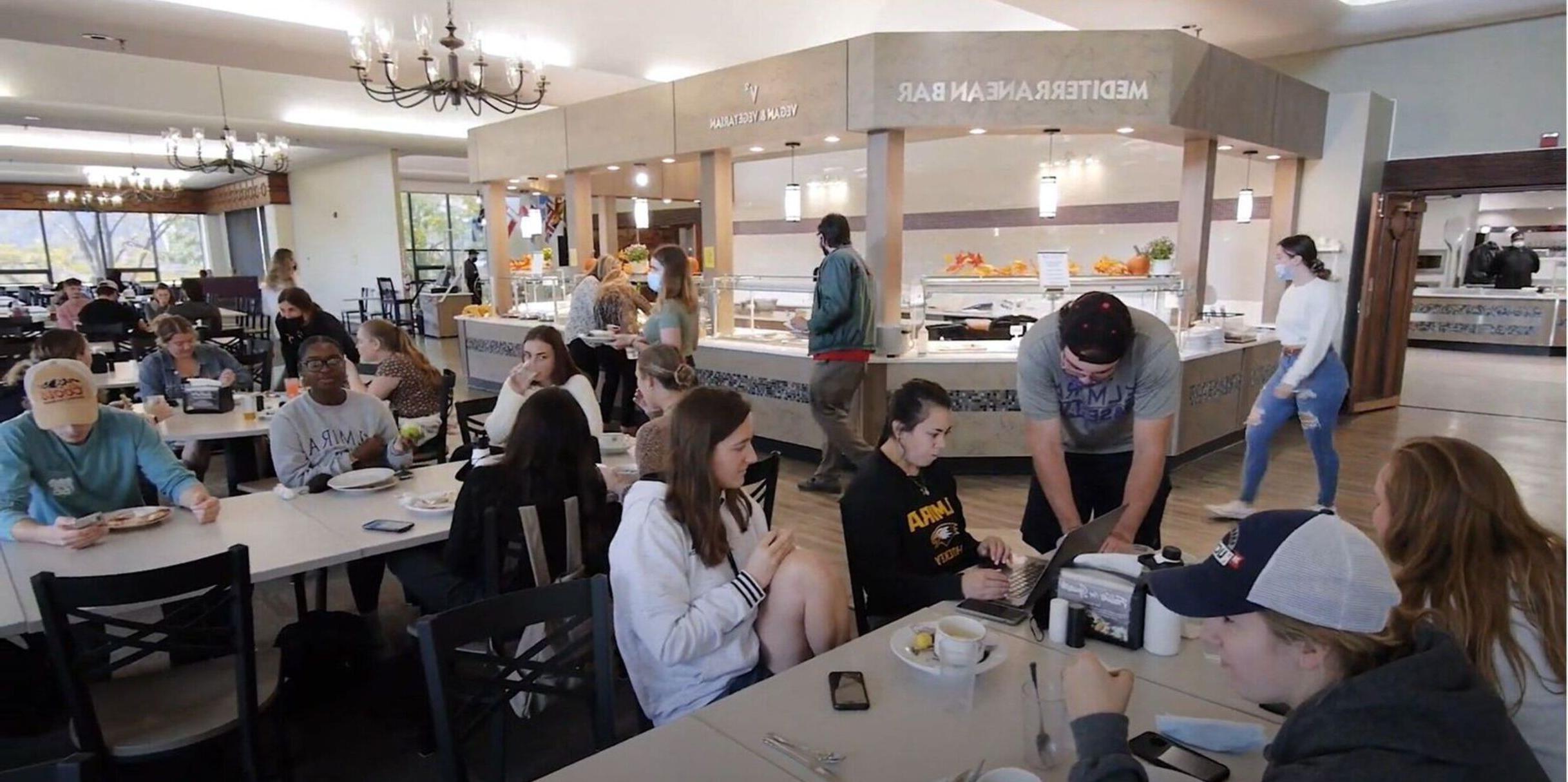 Students enjoy meals in the dining hall